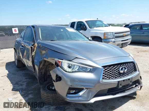 ✅ 2019 Infiniti Q50 Luxe • VIN: JN1EV7AP0KM514389 • Лот: 42082646. Опубликован ранее на IAAI с пробегом 77 339 миль. Бесплатный доступ к архиву аукционных продаж из США и подробный отчёт об истории автомобиля на DreamBid. Изображение 1.