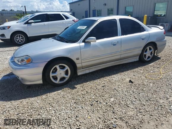 ✅ 1998 Ford Contour • VIN: 1FAFP68G1WK182658 • Lot: 74499894. Wystawiony na Copart z przebiegiem 76 717 mil. Bezpłatny archiwum sprzedaży aukcyjnych z USA i szczegółowy raport historii pojazdu na DreamBid. Zdjęcie 1.