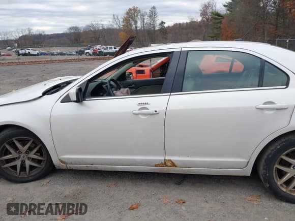 ✅ 2012 Ford Fusion SEL • VIN: 3FAHP0JA7CR376310 • Lot: 43691002. Wystawiony na IAAI z przebiegiem 205 959 mil. Bezpłatny archiwum sprzedaży aukcyjnych z USA i szczegółowy raport historii pojazdu na DreamBid. Zdjęcie 15.