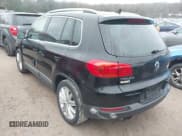 ✅ 2014 Volkswagen Tiguan S • VIN: WVGBV3AX5EW512425 • Lot: 43754178. Listed on IAAI with 157,539 mi. Free auction sales archive from the USA and detailed vehicle history report at DreamBid. Image 3.