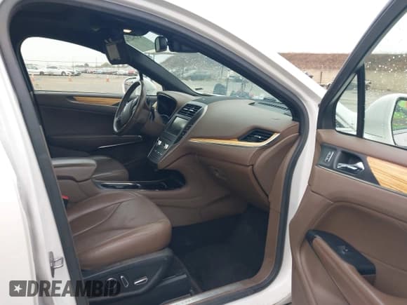 ✅ 2015 Lincoln MKC • VIN: 5LMTJ2AHXFUJ09361 • Lot: 43264216. Listed on IAAI with 106,319 mi. Free auction sales archive from the USA and detailed vehicle history report at DreamBid. Image 5.