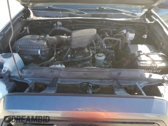 ✅ 2019 Toyota Tacoma SR5 • VIN: 5TFAX5GN5KX161579 • Лот: 90804775. Опубликован ранее на Copart с пробегом 90 045 миль. Бесплатный доступ к архиву аукционных продаж из США и подробный отчёт об истории автомобиля на DreamBid. Изображение 11.