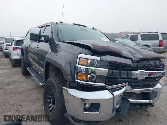 ✅ 2015 Chevrolet Silverado 2500HD LTZ • VIN: 1GC1KWE8XFF104422 • Лот: 41194784. Опубликован ранее на IAAI с пробегом 151 772 миль. Бесплатный доступ к архиву аукционных продаж из США и подробный отчёт об истории автомобиля на DreamBid. Изображение 1.