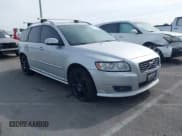 ✅ 2010 Volvo V50 R-Design • VIN: YV1672MJ4A2557403 • Lot: 41407376. Listed on IAAI with 165,004 mi. Free auction sales archive from the USA and detailed vehicle history report at DreamBid. Image 1.