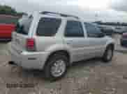 2006 Mercury Mariner Luxury z VIN 4M2CU56196KJ17209, wystawiony jako Copart lot #58450665 z przebiegiem 239 728 mil mil oraz Szkoda całkowita • Salvage title. Historia ofert i sprzedaży dostępna na DreamBid. Obrazek 3.