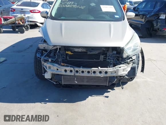 ✅ 2017 Ford Escape SE • VIN: 1FMCU0G95HUA38393 • Lot: 43607284. Listed on IAAI with 91,833 mi. Free auction sales archive from the USA and detailed vehicle history report at DreamBid. Image 12.