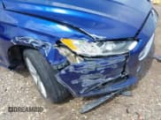 ✅ 2015 Ford Fusion Titanium Hybrid • VIN: 3FA6P0RUXFR126960 • Lot: 42420787. Wystawiony na IAAI z przebiegiem 161 114 mil. Bezpłatny archiwum sprzedaży aukcyjnych z USA i szczegółowy raport historii pojazdu na DreamBid. Zdjęcie 20.