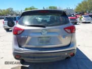 ✅ 2015 Mazda CX-5 Sport • VIN: JM3KE2BEXF0527431 • Lot: 41832024. Listed on IAAI with 131,215 mi. Free auction sales archive from the USA and detailed vehicle history report at DreamBid. Image 16.