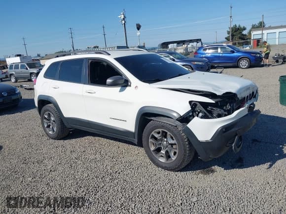 ✅ 2019 Jeep Cherokee Trailhawk • VIN: 1C4PJMBX1KD200443 • Lot: 42455296. Listed on IAAI with 108,645 mi. Free auction sales archive from the USA and detailed vehicle history report at DreamBid. Image 1.
