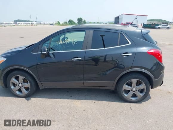 ✅ 2014 Buick Encore • VIN: KL4CJASB3EB611550 • Lot: 42869796. Wystawiony na IAAI z przebiegiem 60 208 mil. Bezpłatny archiwum sprzedaży aukcyjnych z USA i szczegółowy raport historii pojazdu na DreamBid. Zdjęcie 14.