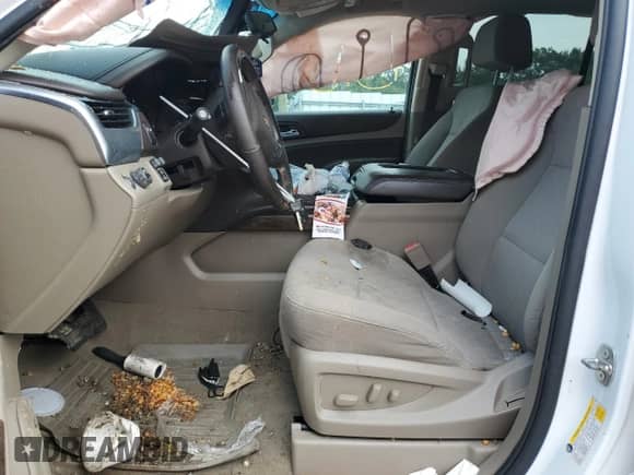 2019 Chevrolet Tahoe LS with VIN 1GNSCAKC9KR151048, listed as a Copart auction lot 69196595 with 100,702 mi miles and Salvage title. Bid and sale history available at DreamBid. Image 7.