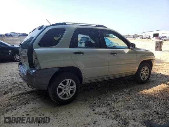 ✅ 2008 Kia Sportage LX • VIN: KNDJF723987507503 • Lot: 69040095. Listed on Copart with 164,137 mi. Free auction sales archive from the USA and detailed vehicle history report at DreamBid. Image 3.