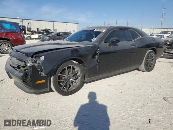 ✅ 2013 Dodge Challenger SXT • VIN: 2C3CDYAG2DH530925 • Lot: 77192334. Wystawiony na Copart z przebiegiem 201 989 mil. Bezpłatny archiwum sprzedaży aukcyjnych z USA i szczegółowy raport historii pojazdu na DreamBid. Zdjęcie 1.