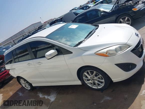 ✅ 2015 Mazda 5 Touring • VIN: JM1CW2CL4F0189080 • Lot: 43557158. Listed on IAAI with 74,626 mi. Free auction sales archive from the USA and detailed vehicle history report at DreamBid. Image 14.