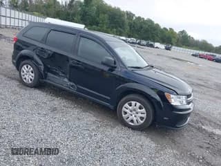 ✅ 2015 Dodge Journey American Value • VIN: 3C4PDCABXFT600296 • Лот: 43387282. Опубликован ранее на IAAI с пробегом 98 029 миль. Бесплатный доступ к архиву аукционных продаж из США и подробный отчёт об истории автомобиля на DreamBid. Изображение 1.