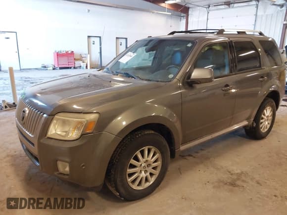 ✅ 2010 Mercury Mariner Premier • VIN: 4M2CN9HGXAKJ11983 • Lot: 41512060. Listed on IAAI with 154,971 mi. Free auction sales archive from the USA and detailed vehicle history report at DreamBid. Image 17.