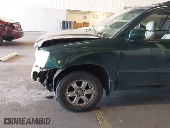 2002 Toyota Highlander z VIN JTEHF21A120046228, wystawiony jako IAAI lot #43230971 z przebiegiem 214 451 mil mil oraz . Historia ofert i sprzedaży dostępna na DreamBid. Obrazek 6.