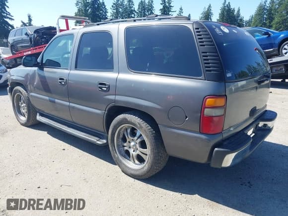 ✅ 2002 Chevrolet Tahoe LS • VIN: 1GNEC13V72J242640 • Lot: 42752739. Listed on IAAI with 416,311 mi. Free auction sales archive from the USA and detailed vehicle history report at DreamBid. Image 3.