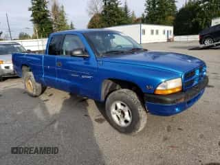 1998 Dodge Dakota SLT z VIN 1B7GG22XXWS598594, wystawiony jako Copart lot #75330344 z przebiegiem 167 518 mil mil oraz Czysty tytuł • Clean title. Historia ofert i sprzedaży dostępna na DreamBid. Obrazek 4.