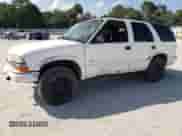 2004 Chevrolet Blazer Fleet z VIN 1GNCS13X64K155966, wystawiony jako Copart lot #53891204 z przebiegiem 132 761 mil mil oraz Szkoda całkowita • Salvage title. Historia ofert i sprzedaży dostępna na DreamBid. Obrazek 1.