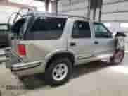 1999 Chevrolet Blazer LS with VIN 1GNDT13W9X2105768, listed as a Copart auction lot 80141174 with 193,804 mi miles and Salvage title. Bid and sale history available at DreamBid. Image 3.