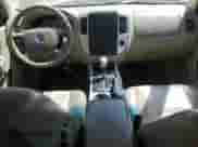 2006 Mercury Mariner Luxury z VIN 4M2YU56196DJ06804, wystawiony jako Copart lot #56183815 z przebiegiem 181 504 mil mil oraz Nie do naprawy • Non repairable. Historia ofert i sprzedaży dostępna na DreamBid. Obrazek 8.