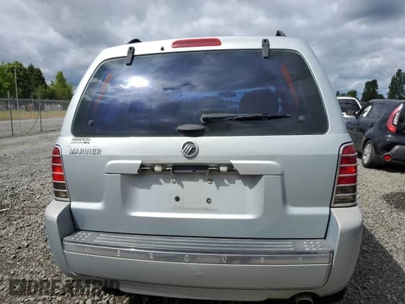 2006 Mercury Mariner Convenience z VIN 4M2YU56Z26DJ06214, wystawiony jako Copart lot #56704775 z przebiegiem 235 939 mil mil oraz Szkoda całkowita • Salvage title. Historia ofert i sprzedaży dostępna na DreamBid. Obrazek 6.