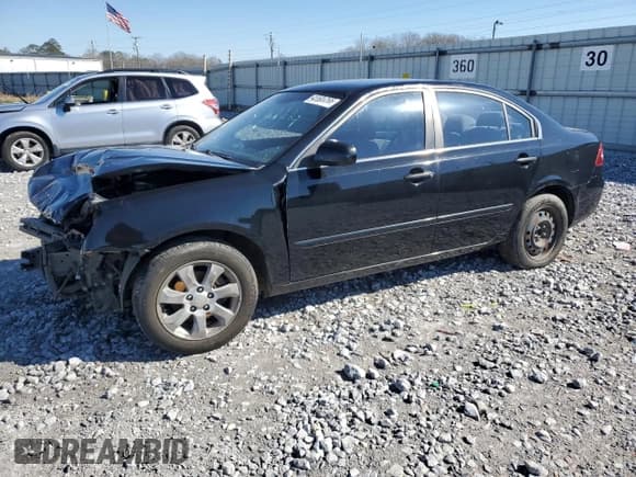 ✅ 2007 Kia Optima LX • VIN: KNAGE124475130198 • Лот: 45585255. Опубликован ранее на Copart с пробегом 303 974 миль. Бесплатный доступ к архиву аукционных продаж из США и подробный отчёт об истории автомобиля на DreamBid. Изображение 1.