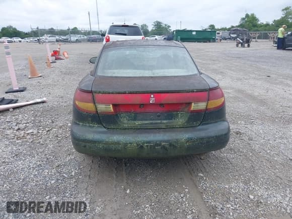 ✅ 1997 Saturn SC • VIN: 1G8ZF1285VZ100218 • Лот: 42881895. Опубликован ранее на IAAI с пробегом 114 002 миль. Бесплатный доступ к архиву аукционных продаж из США и подробный отчёт об истории автомобиля на DreamBid. Изображение 16.