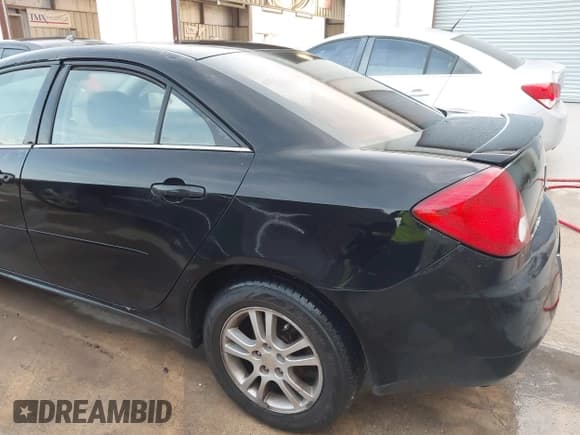 ✅ 2006 Pontiac G6 6-Cyl • VIN: 1G2ZG558264252742 • Lot: 42647619. Listed on IAAI with 214,525 mi. Free auction sales archive from the USA and detailed vehicle history report at DreamBid. Image 6.