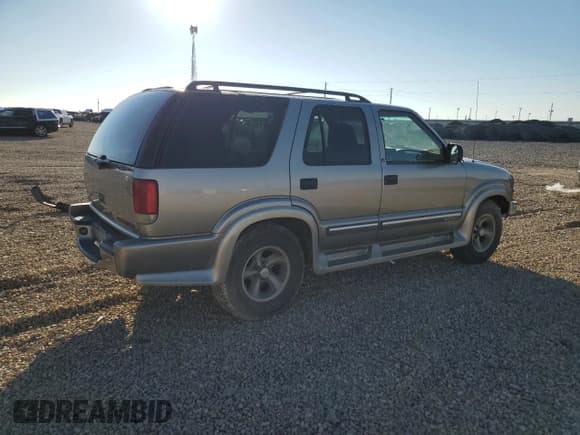 ✅ 2000 Chevrolet Blazer LT • VIN: 1GNCS13W0Y2164949 • Лот: 85867745. Опубликован ранее на Copart с пробегом 185 180 миль. Бесплатный доступ к архиву аукционных продаж из США и подробный отчёт об истории автомобиля на DreamBid. Изображение 3.