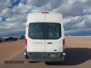 ✅ 2015 Ford Transit Cargo • VIN: 1FTNR2XM7FKB31360 • Lot: 43480347. Listed on IAAI with 215,819 mi. Free auction sales archive from the USA and detailed vehicle history report at DreamBid. Image 17.