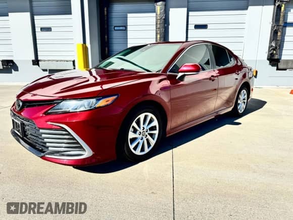 2022 Toyota Camry LE с VIN 4T1C11BK2NU059674, выставлен на аукционе Copart как лот 86409205 с пробегом 86 145 миль миль и Списание • Salvage title. История ставок и продаж доступна на DreamBid. Изображение 2.