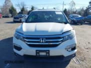 ✅ 2017 Honda Pilot EX-L • VIN: 5FNYF6H5XHB098584 • Lot: 43664045. Listed on IAAI with 119,767 mi. Free auction sales archive from the USA and detailed vehicle history report at DreamBid. Image 12.