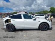 ✅ 2023 Tesla Model Y Performance • VIN: 7SAYGDEF5PF874118 • Lot: 43168239. Wystawiony na IAAI z przebiegiem 31 810 mil. Bezpłatny archiwum sprzedaży aukcyjnych z USA i szczegółowy raport historii pojazdu na DreamBid. Zdjęcie 14.