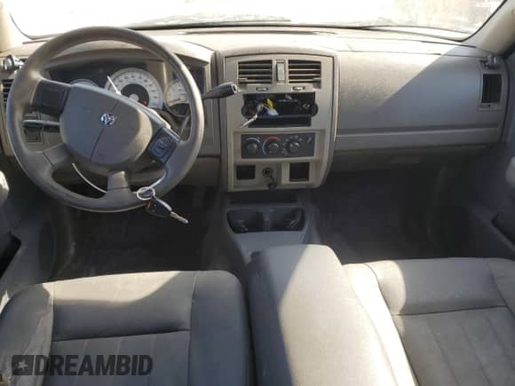 2005 Dodge Dakota SLT with VIN 1D7HE48N55S133057, listed as a Copart auction lot 76708354 with 134,561 mi miles and Salvage title. Bid and sale history available at DreamBid. Image 8.