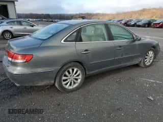 2007 Hyundai Azera SE z VIN KMHFC46F57A174411, wystawiony jako Copart lot #78999364 z przebiegiem 131 941 mil mil oraz Szkoda całkowita • Salvage title. Historia ofert i sprzedaży dostępna na DreamBid. Obrazek 3.