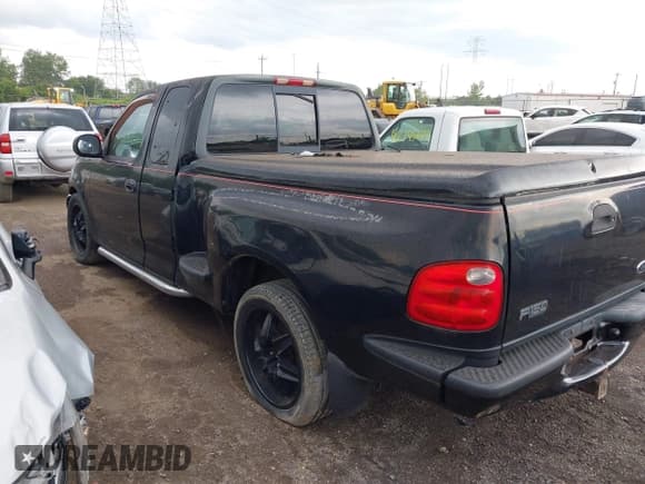 ✅ 2000 Ford F-150 XL • VIN: 2FTRX07L3YCB03694 • Lot: 42713596. Listed on IAAI with Not provided. Free auction sales archive from the USA and detailed vehicle history report at DreamBid. Image 3.