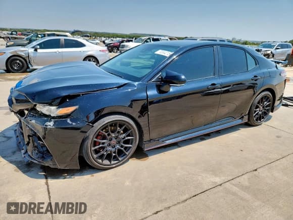 ✅ 2023 Toyota Camry TRD • VIN: 4T1KZ1AK6PU072565 • Лот: 70344215. Опубликован ранее на Copart с пробегом 25 220 миль. Бесплатный доступ к архиву аукционных продаж из США и подробный отчёт об истории автомобиля на DreamBid. Изображение 1.