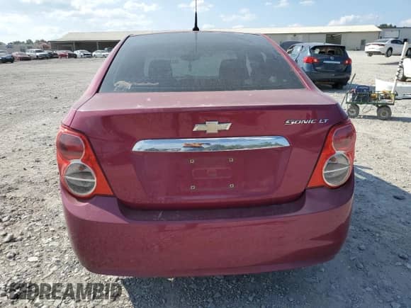 2014 Chevrolet Sonic LT z VIN 1G1JC5SH4E4107699, wystawiony jako Copart lot #68643334 z przebiegiem 240 294 mil mil oraz Szkoda całkowita • Salvage title. Historia ofert i sprzedaży dostępna na DreamBid. Obrazek 6.