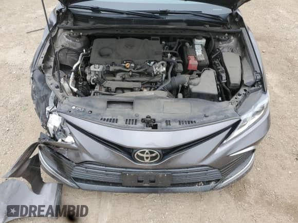 2021 Toyota Camry LE z VIN 4T1R11BK4MU035322, wystawiony jako Copart lot #64804995 z przebiegiem 89 483 mil mil oraz Szkoda całkowita • Salvage title. Historia ofert i sprzedaży dostępna na DreamBid. Obrazek 11.