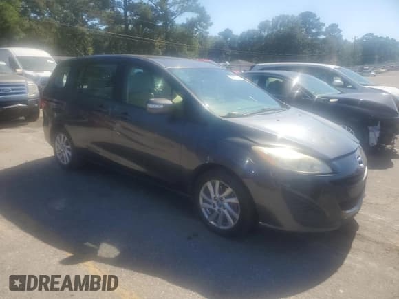 ✅ 2014 Mazda 5 Sport • VIN: JM1CW2BLXE0165897 • Lot: 89671535. Listed on Copart with 101,684 mi. Free auction sales archive from the USA and detailed vehicle history report at DreamBid. Image 4.