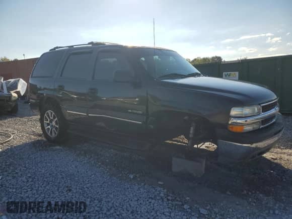 2003 Chevrolet Tahoe LT с VIN 1GNEC13Z73R251327, выставлен на аукционе Copart как лот 85694465 с пробегом 132 064 миль миль и Списание • Salvage title. История ставок и продаж доступна на DreamBid. Изображение 4.