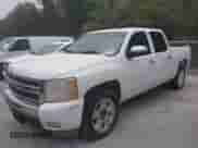 2010 Chevrolet Silverado 1500 LT with VIN 3GCRCSE03AG127857, listed as a IAAI auction lot 43555040 with 252,652 mi miles and . Bid and sale history available at DreamBid. Image 2.