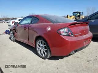 2007 Hyundai Tiburon GT z VIN KMHHN66F27U255380, wystawiony jako Copart lot #48105165 z przebiegiem 142 966 mil mil oraz Szkoda całkowita • Salvage title. Historia ofert i sprzedaży dostępna na DreamBid. Obrazek 2.