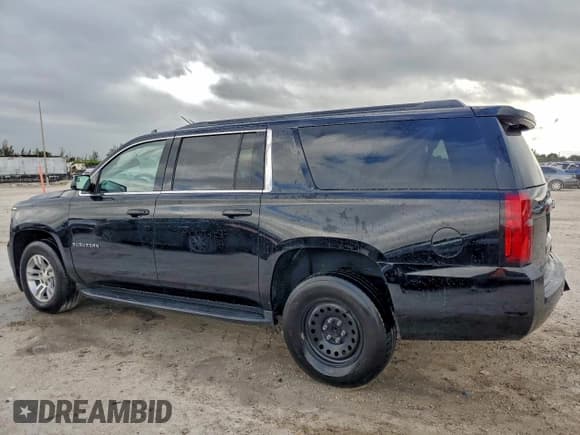 ✅ 2018 Chevrolet Suburban LS • VIN: 1GNSCGEC3JR315584 • Lot: 94428525. Listed on Copart with 96,373 mi. Free auction sales archive from the USA and detailed vehicle history report at DreamBid. Image 2.