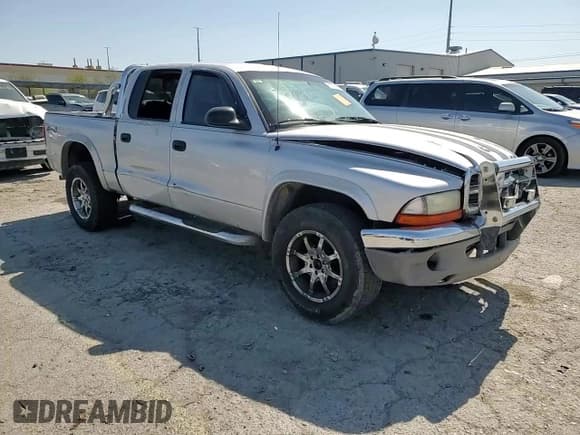 ✅ 2004 Dodge Dakota SLT • VIN: 1D7HG48N74S509797 • Lot: 57797055. Wystawiony na Copart z przebiegiem 214 275 mil. Bezpłatny archiwum sprzedaży aukcyjnych z USA i szczegółowy raport historii pojazdu na DreamBid. Zdjęcie 13.