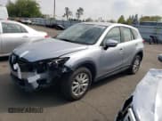 ✅ 2016 Mazda CX-5 Sport • VIN: JM3KE4BY2G0618930 • Lot: 54608855. Listed on Copart with 126,453 mi. Free auction sales archive from the USA and detailed vehicle history report at DreamBid. Image 1.