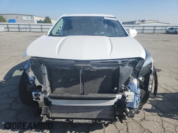 ✅ 2021 Cadillac XT4 FWD Luxury • VIN: 1GYAZAR46MF033829 • Лот: 82772905. Опубликован ранее на Copart с пробегом 32 628 миль. Бесплатный доступ к архиву аукционных продаж из США и подробный отчёт об истории автомобиля на DreamBid. Изображение 5.