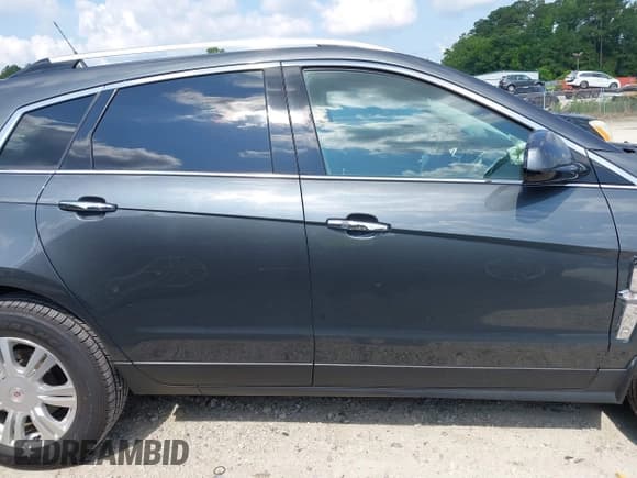 ✅ 2012 Cadillac SRX Luxury Collection • VIN: 3GYFNAE35CS641592 • Lot: 42382400. Wystawiony na IAAI z przebiegiem 150 559 mil. Bezpłatny archiwum sprzedaży aukcyjnych z USA i szczegółowy raport historii pojazdu na DreamBid. Zdjęcie 13.